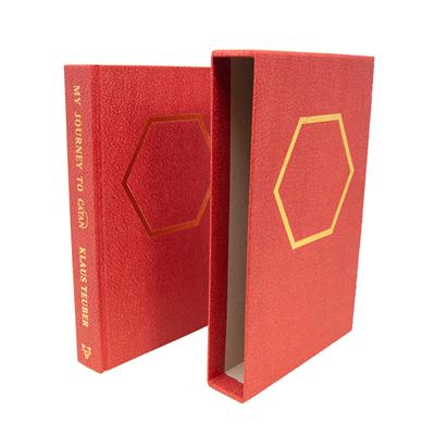 My Journey to Catan Red Book with hexagon on front