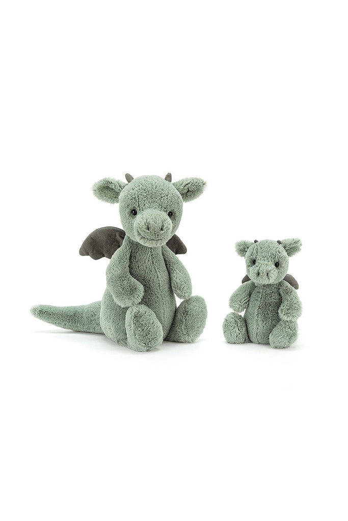 Light teal colored dragons one large and one a baby that have grey wings.